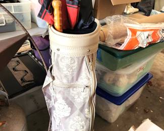 Ladies golf bag and umbrellas