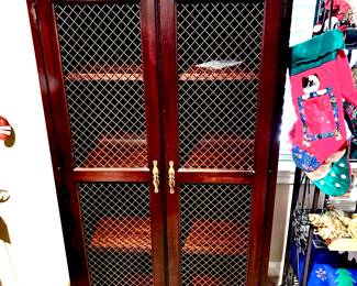 Handsome book cabinet with mesh doors