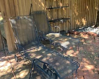 Huge metal patio furniture collection, including this plant stand and two chaise lounges