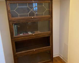 Leaded glass barriers cabinet with one piece of glass missing