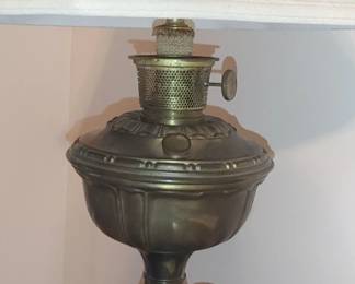 Antique brass kerosene lamp that has been electrified