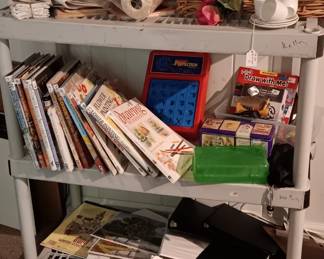 Lots of crafting supplies and books in the craft room
