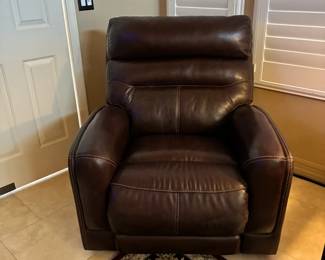 3 brown leather recliners