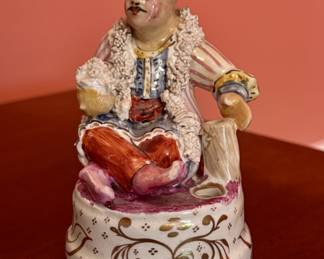 A Victorian Staffordshire hand painted porcelain figure of a seated Sultan…ink well