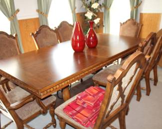 94" table (with 18" leaf), two captain's chairs, six side chairs
