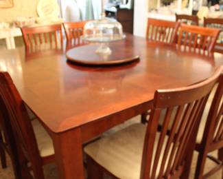 counter-height 60" square dining table and eight chairs
