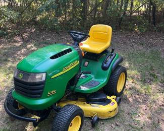 John Deere lawn mower, works great. Put in new battery this summer.
