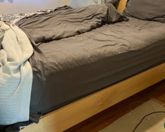 Bed with wooden frame