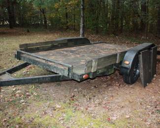 Twin axle low trailer w/ramps