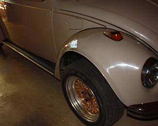 68 VW bug: Owned by gentleman in his 80's. Always garage kept and no rust. New Eagle GT P205/60 GR15 tires on new gold wheels. New: Fender flares/windshield/back glass & side glass/badges/rubber gaskets/ blinkers/bumpers & mounts/exhaust/outside mirror/head lights  NEW Interior: door panels/seats (front and rear)/head liner/carpet.