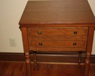 Sears Kenmore sewing machine in cabinet