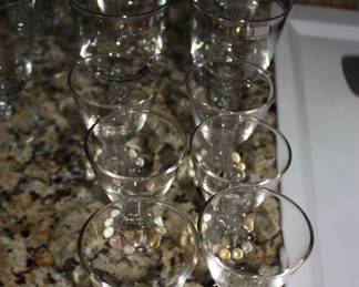 6 juice glasses & 6 silver rim stemmed water glasses