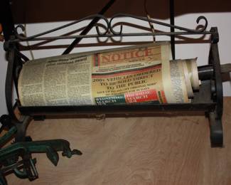 Vintage newspaper log roller