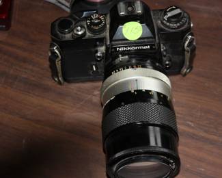 NIKKORMAT .5 mm film camera w/zoom lens & battery