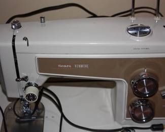 Sears Kenmore sewing machine in cabinet