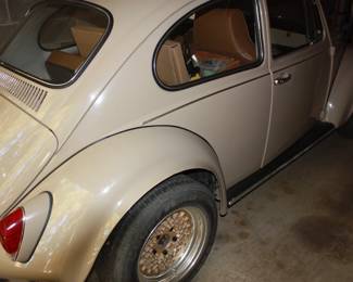 68 VW bug: Owned by gentleman in his 80's. Always garage kept and no rust. New Eagle GT P205/60 GR15 tires on new gold wheels. New: Fender flares/windshield/back glass & side glass/badges/rubber gaskets/ blinkers/bumpers & mounts/exhaust/outside mirror/head lights  NEW Interior: door panels/seats (front and rear)/head liner/carpet.