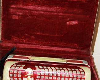 Red Capri Accordion in original case. Plays beautifully