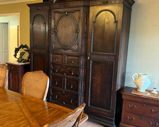 Beautiful solid wood antique armoire, mirrors inside 2 wardrobes, middle section has drawers.  The armoire is actually 3 pieces.  Available for early purchase!