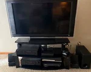 Sony Bravia Flat Screen TV with Panasonic VCR DVD Player and Surround Sound System