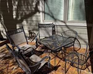Black Metal Outdoor Patio Dining Table Set with Mesh and Fabric Chairs