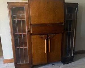 Vintage Wooden Cabinet with Glass Panel Doors and Carved Details