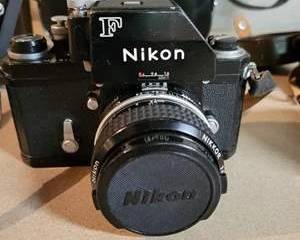 Nikon F 35mm SLR Camera with Nikkor Lenses, Instruction Manual, and Accessories