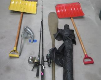 Lot 280. Snow shovels, old fishing rods, canoe paddle, and more