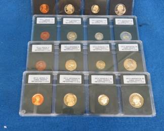 Lot 325. Three 1977 S and one 1981 S encapsulated type sets all INB certified cameo proof 70. Each set has a penny, nickel, dime, and quarter