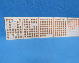 Lot 299. Dansco Lincoln Penny folders with pennies from 1909 through 1992, including some hard-to-find dates including 39 pennies from 1909 through 1929.