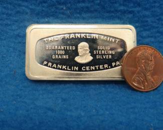 Lot 371. Franklin Mint Bank-marked sterling silver ingot. 65.2 grams.