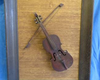 Lot 135. Framed violin and bow