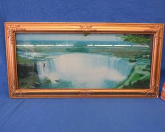 Lot 76. Waterfall wall art in a fancy frame
