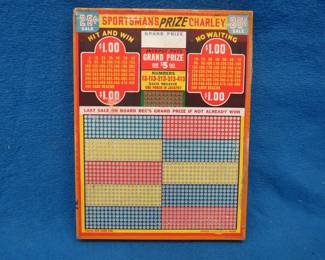Lot 400. Before there were pull-tabs there were punchboards. An original unpunched game.