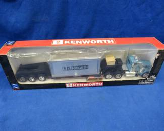 Lot 55. NewRay 1:32 Die-Cast Kenworth Tractor Trailer in original box
