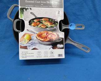 Lot 348. NIP enamel cast iron cookware set