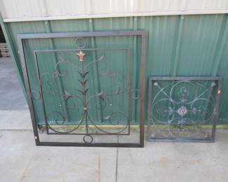 Lot 407. Two pieces of decorative metalwork. 36" x 36" and 22" x 22".