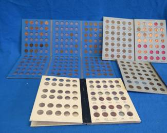 Lot 327. Four partially filled Lincoln penny albums. See photos for dates.
