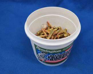 Lot 338. Partial bucket (over 100) of Remington .223 rounds