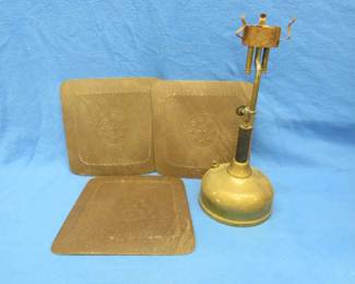 Lot 34. Coleman Quick-Lite with a hole in the bottom and three replacement seats for wooden chairs
