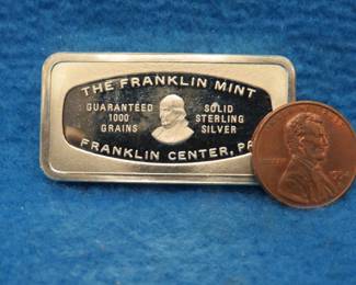 Lot 369. Franklin Mint Bank-marked sterling silver ingot. 65.3 grams.