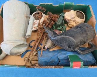 Lot 66. Frog flower pots, tent stakes, oil container, and more
