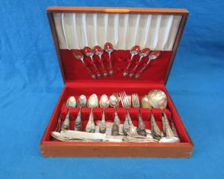 Lot 72. 1881 Rogers grape pattern silverplate flatware in a wooden case
