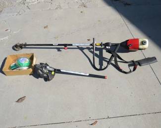 Lot 154. Craftsman 32cc gas-powered trimmer with a brush blade attachment. Good compression. Includes extra string.