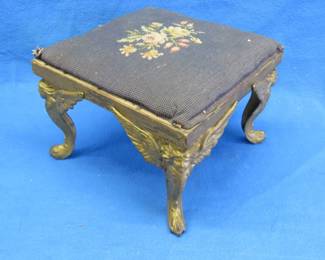 Lot 173. Vintage embroidered foot stool with metal legs