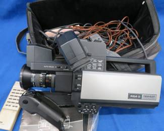 Lot 166. Vintage RCA video camera with carry case and all kinds of cords. Untested