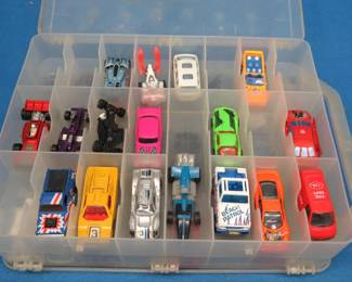 Lot 303. Two-level case of Hot Wheels and other cars