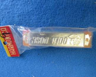 Lot 103. Gold Rose toy harmonica NIP Made in Japan