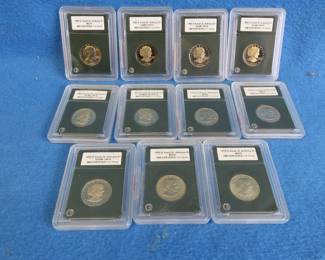 Lot 86. Twelve encapsulated Susan B Anthony quarters, all INB certified DCAM PR-70, MS 70, or Cameo proof