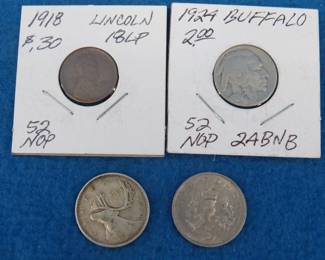Lot 264. Four coins: 1924 P Buffalo nickel. 1918 P Lincoln penny. 1942 silver Canadian quarter. 1970 5 pence coin