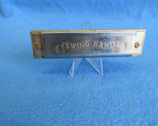 Lot 104. Swing Band 12-hole tremolo harmonica. Made in Japan